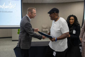 CHAN Founder receives his certificate of achievement for completing the Collaborative Capacity Building Grant Program.